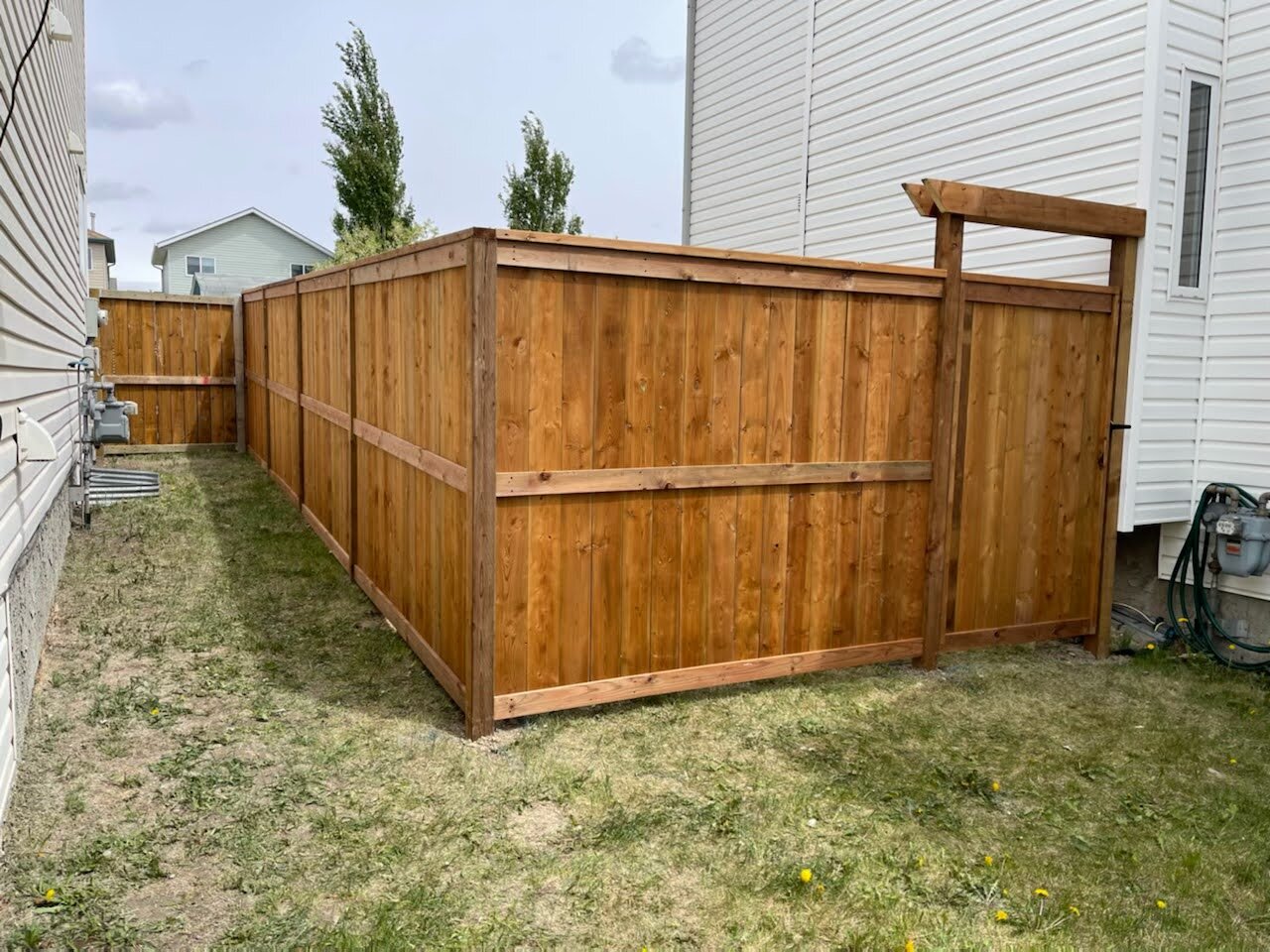 Stained Cedar Backyard Fence